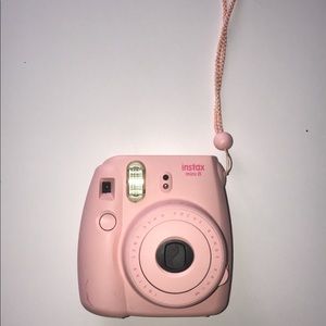 baby pink polaroid camera